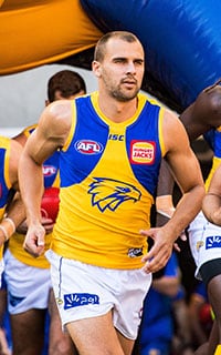 AFL 2018 Round 06 - Fremantle v West Coast PERTH, AUSTRALIA - APRIL 29: Dom Sheed of the Eagles enters the arena during the 2018 AFL round six match between the Fremantle Dockers and the West Coast Eagles at Optus Stadium on April 29, 2018 in Perth, Australia. (Photo by Daniel Carson/AFL Media)